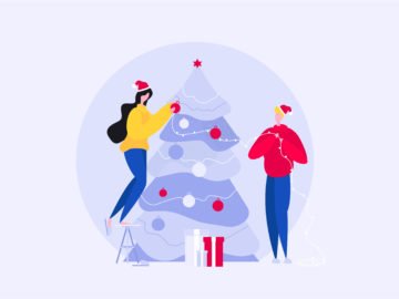 Couple Decorating The Christmas Tree